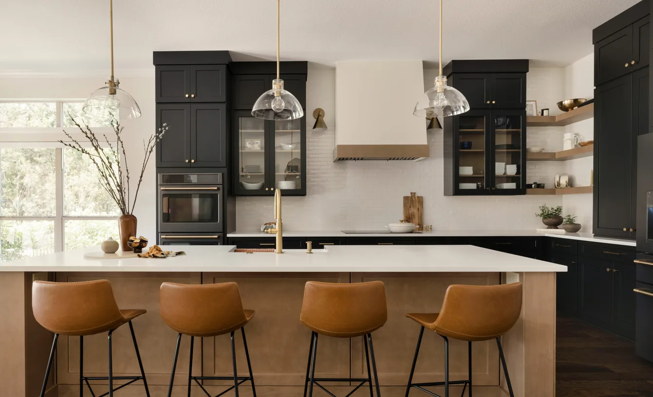 Black shaker kitchen with white counters from the Cabinet IQ project gallery