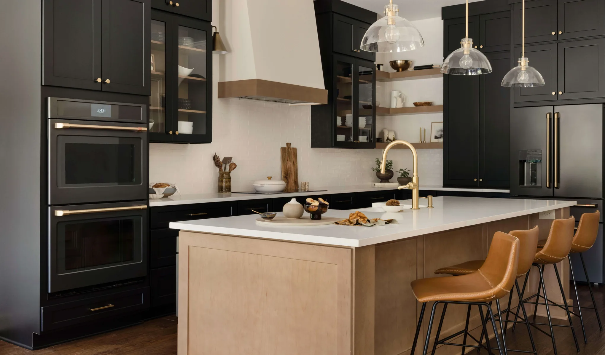 Completed Cabinet IQ kitchen with two-tone cabinetry and stone countertops